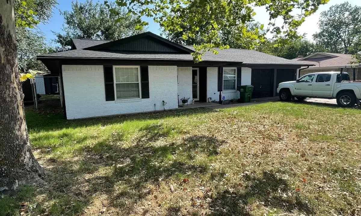 Professional roofing crew working on a residential roof in Hialeah Gardens